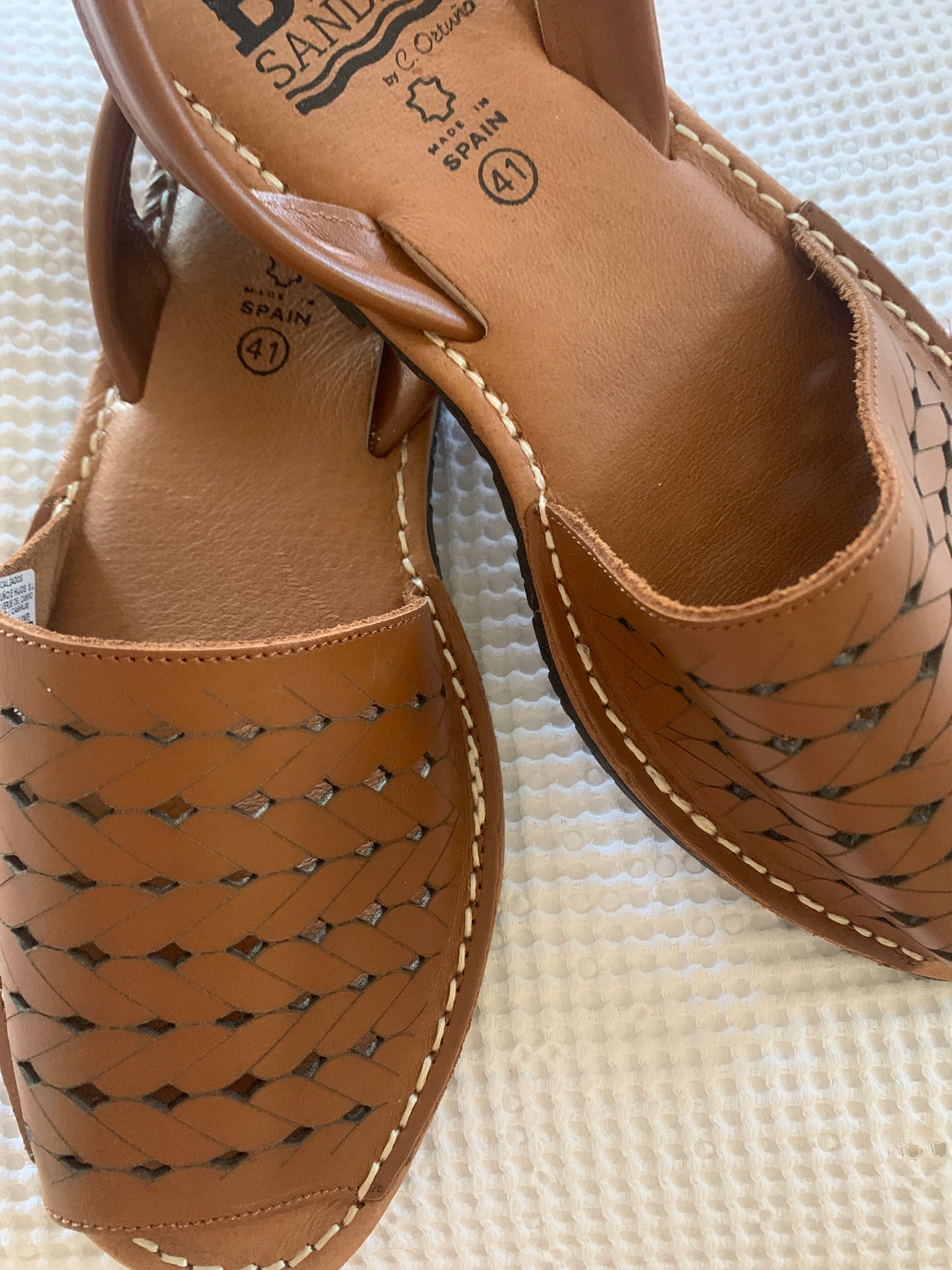 Ladies leather tan sandal with laser cut pattern 4